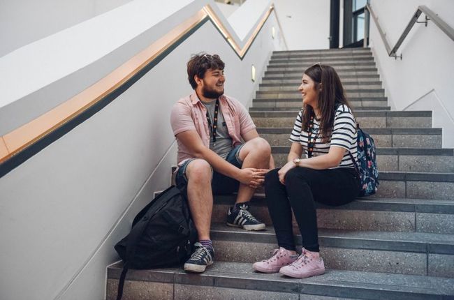 Students sitting on stairs