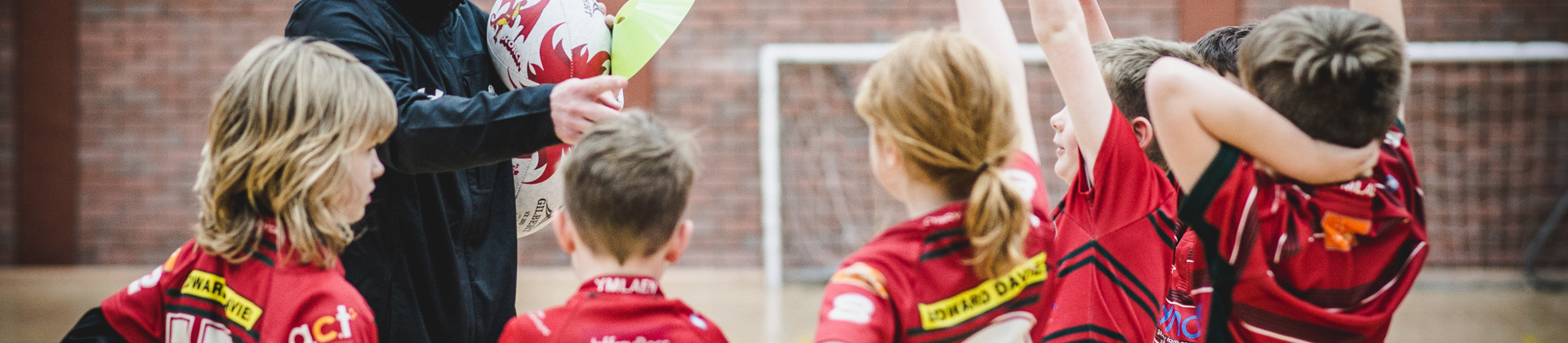 Photo of children playing rugby 