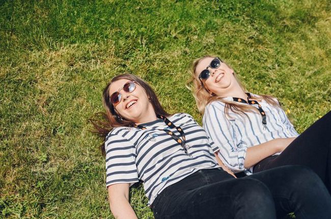 Wome lying on the floor in the sun