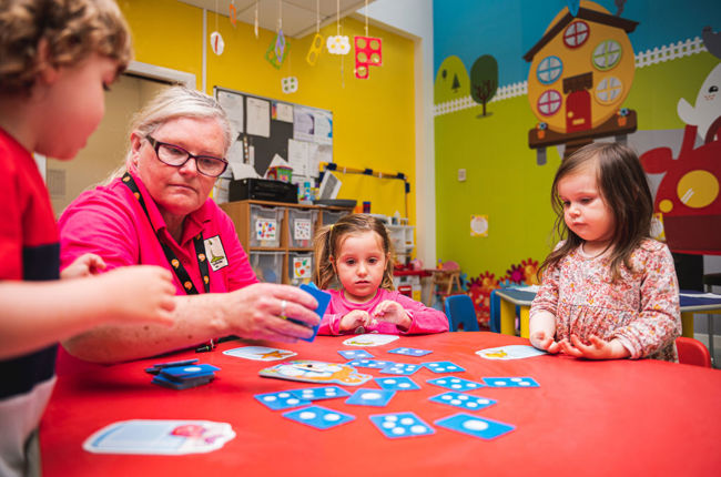 A photo of young children in the classroom